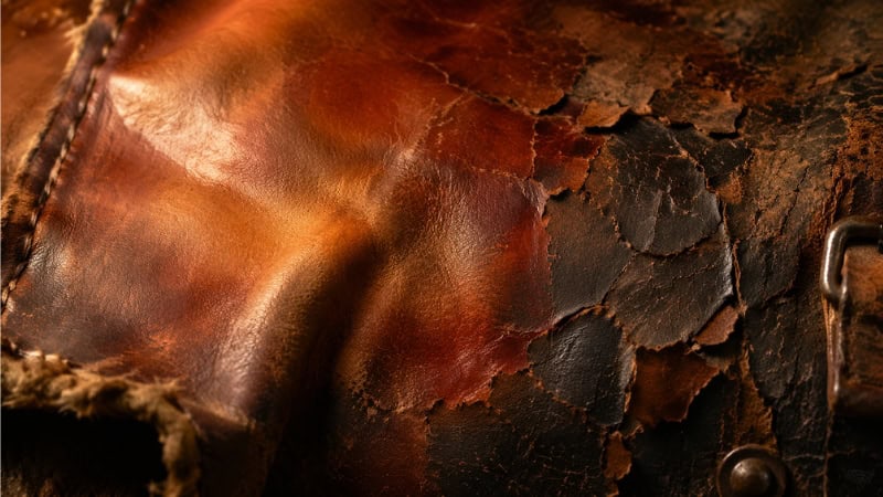 aged leather developing rich patina with visible color